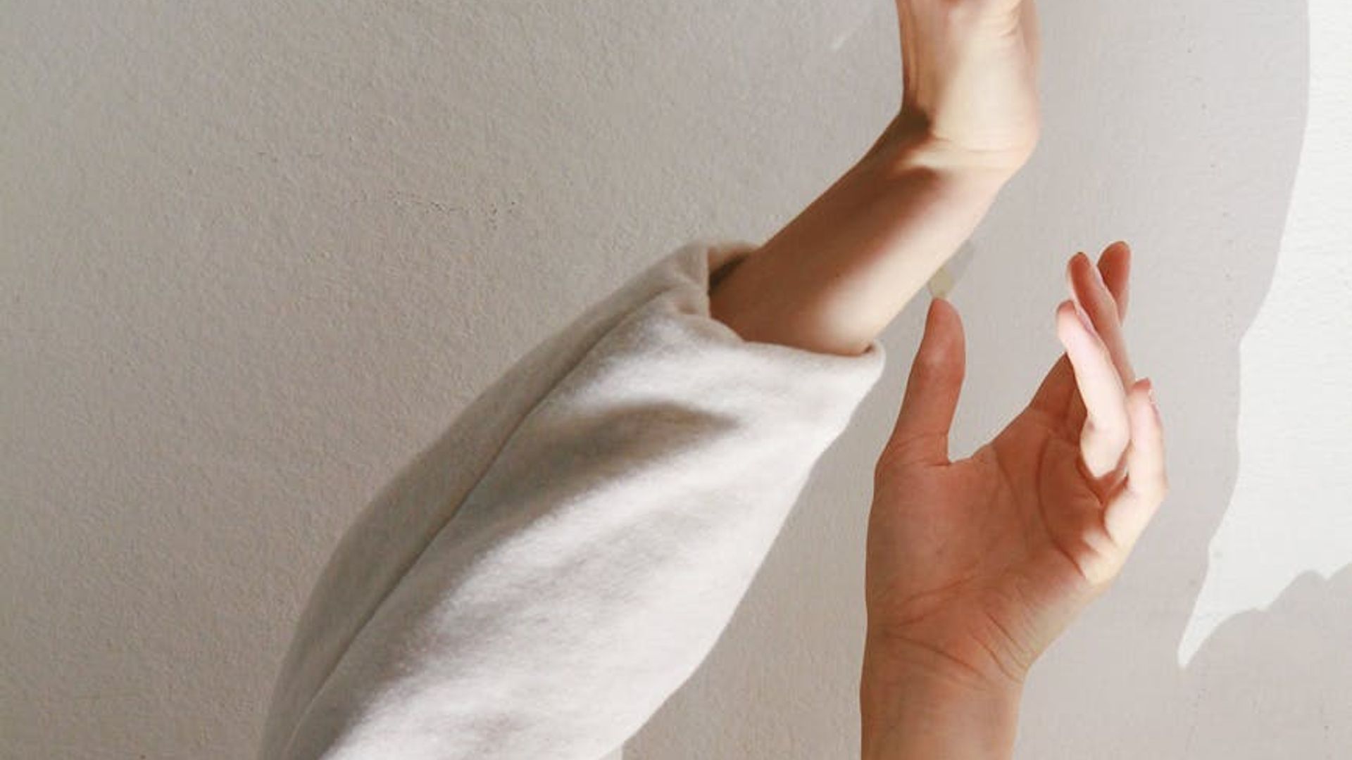 Serene background with abstract light forms suggesting movement and calm.